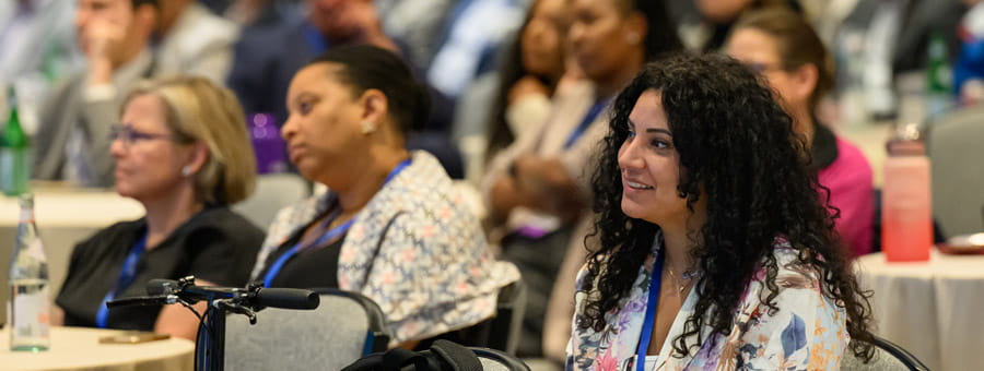 ALC attendees listen to keynote presentation.