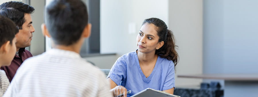 Doctor talks to family about serious topic