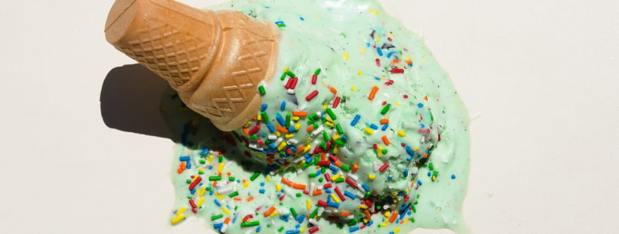 Spilled ice cream on the ground.