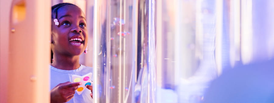 4-year-old Maliyah interacts with items in the pre-op sensory room. Photo: Boom Crate Studios, Dayton Children's Hospital