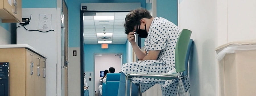 Patient sitting in waiting area.