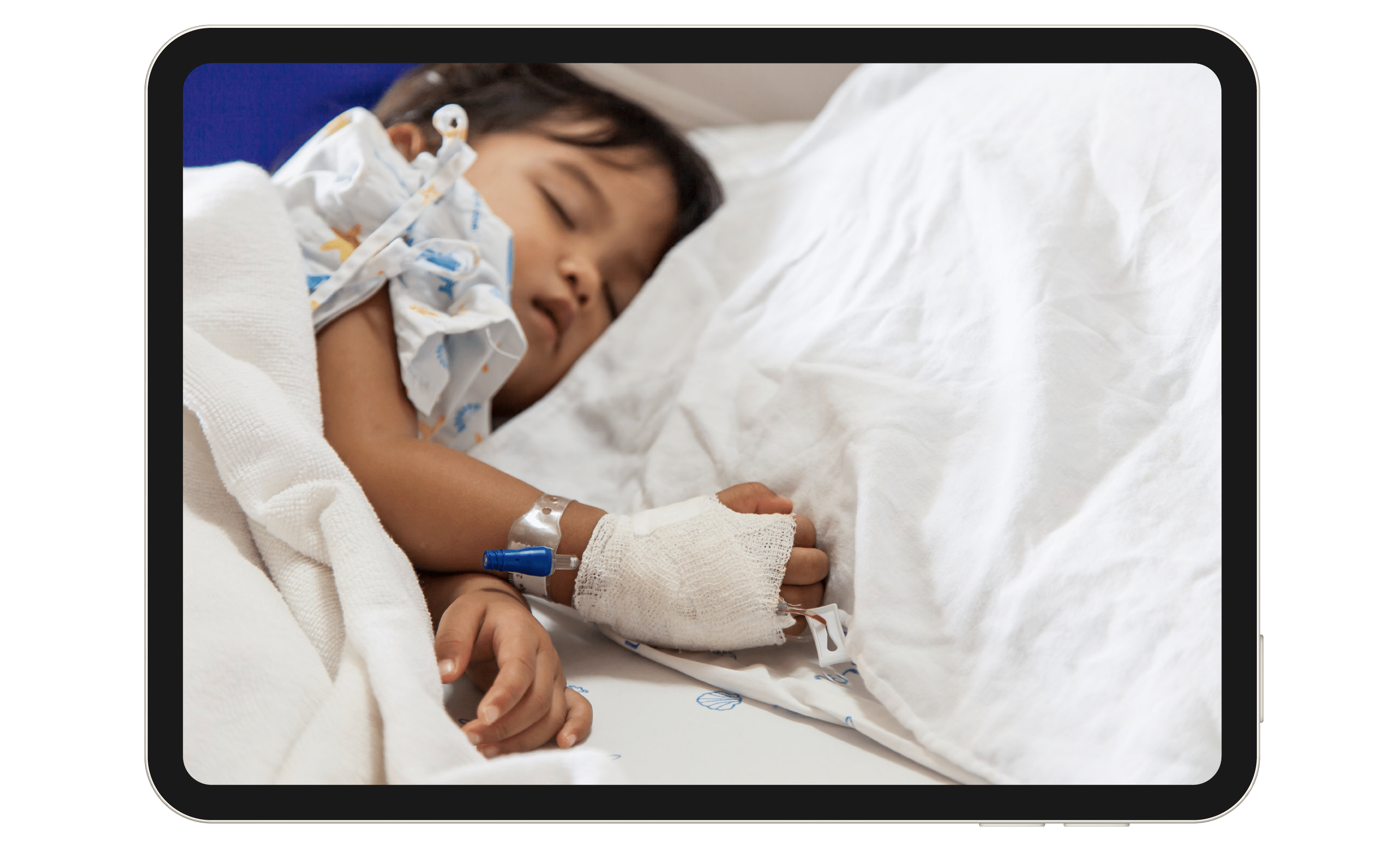 Young child patient in a hospital bed.