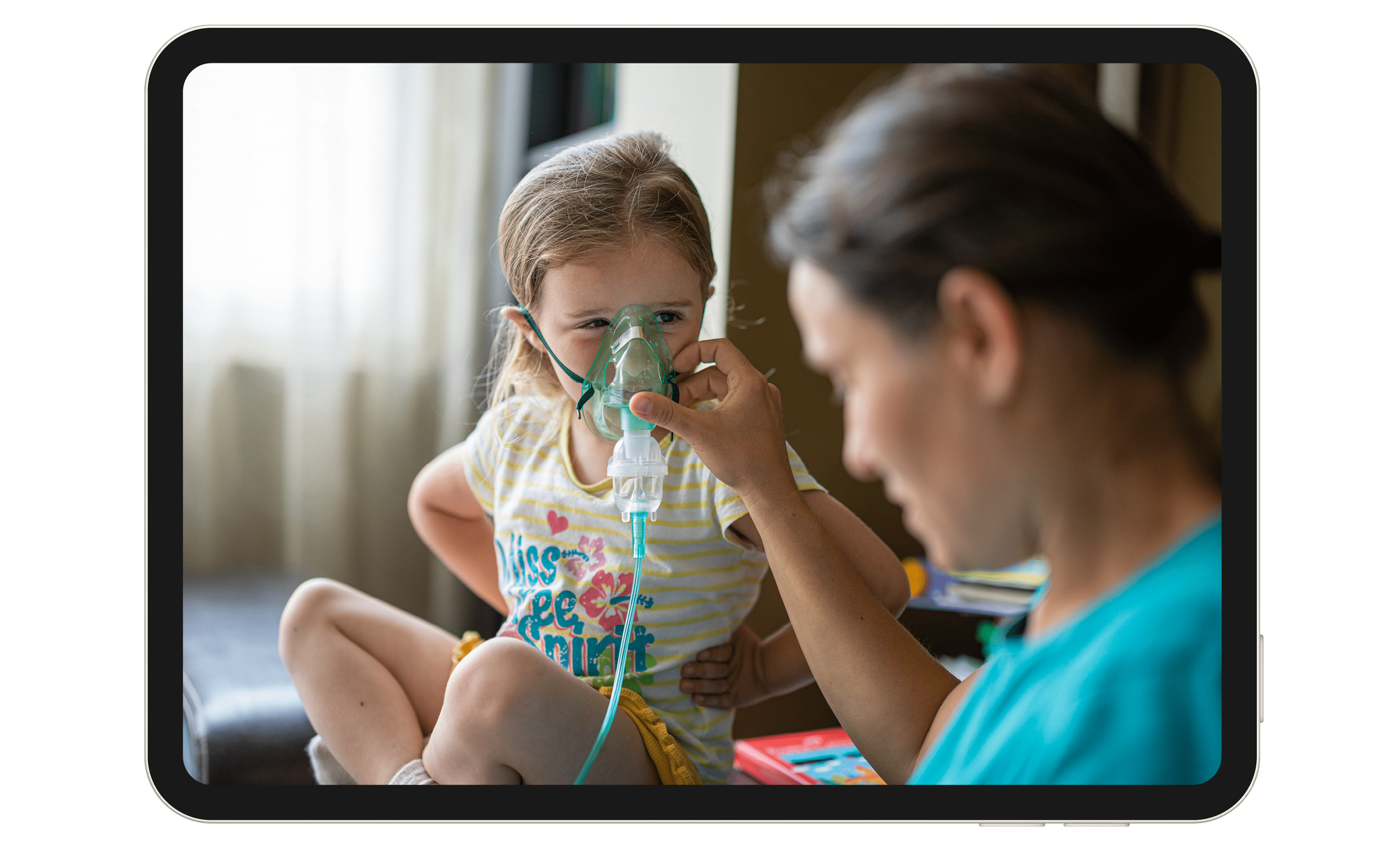 A nurse holding an oxygen mask up to a child's face.