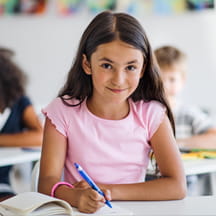 Elementary school student in classroom.