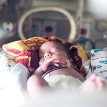Baby in NICU sleeping